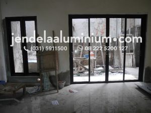 Pintu sliding aluminium rumah sutorejo selatan surabaya