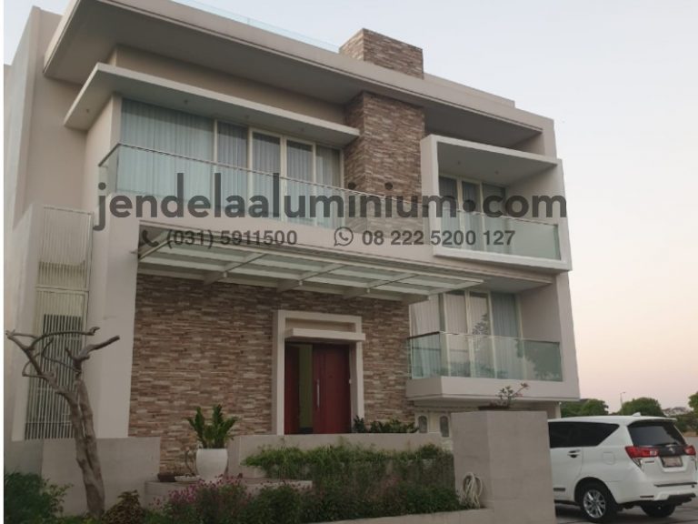 Aluminium dan Kaca Tempered untuk Rumah Waterfront Citraland Surabaya